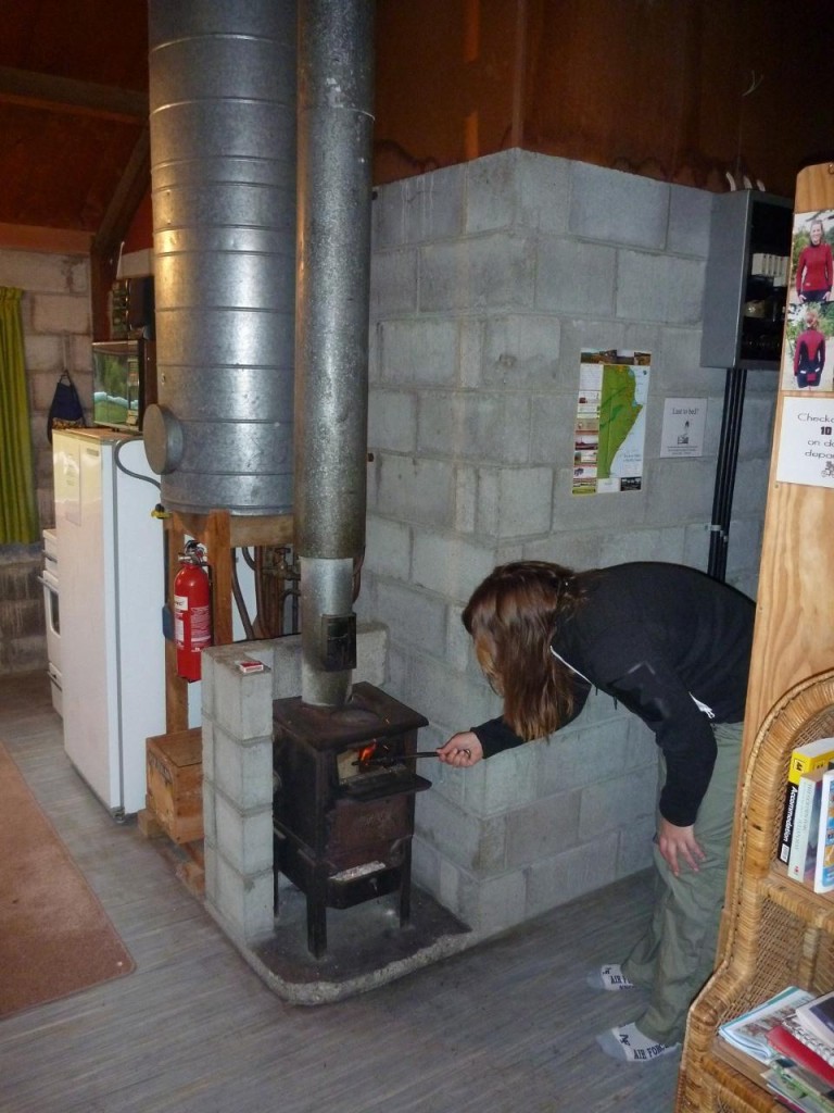Jocelyn working the old wood fireplace. 