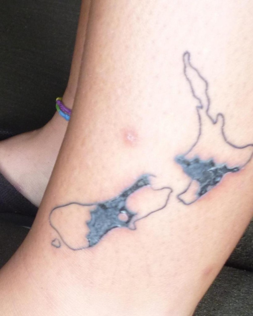 Another tattoo! And yes I have a matching one. We had this done in Queenstown. It is scabbing over now. That is a bicycle gear inside the islands of New Zealand. Mine doesn't look as pretty! We are still recovering from the sandfly bites. 
