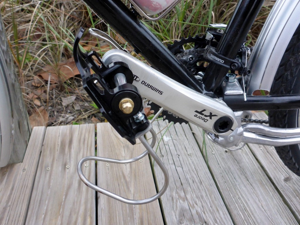 On my first two tours I used clipless pedals with biking shoes. Now I can use any shoe with this clip.