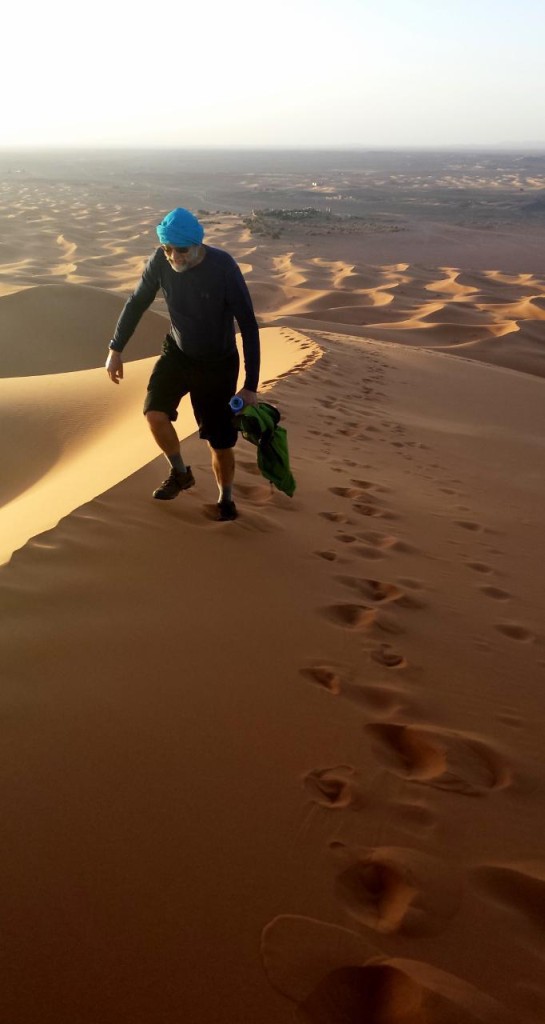 Walking up the highest dune near our camp for the sunset. Some day I need to retire! 