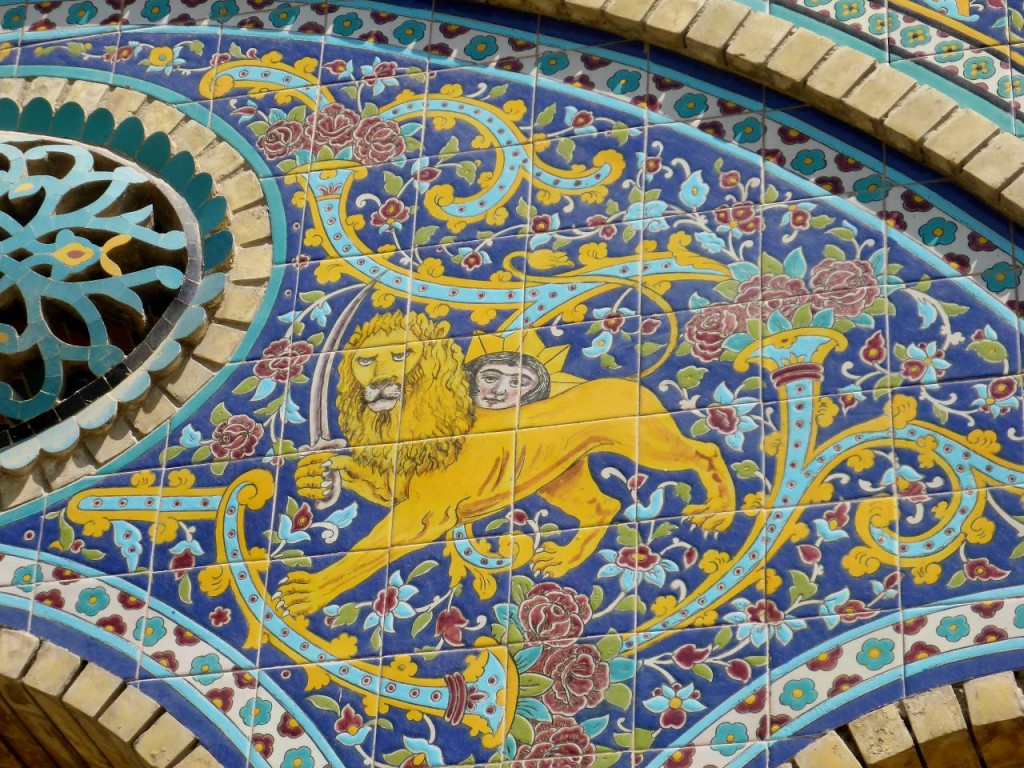 The symbol of Iran - a lion holding a sword and the rising sun. In Iran the sun is female. 