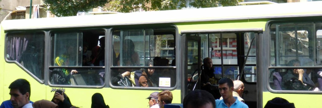 Women sit in the back of the bus due to an unwritten religious law. 