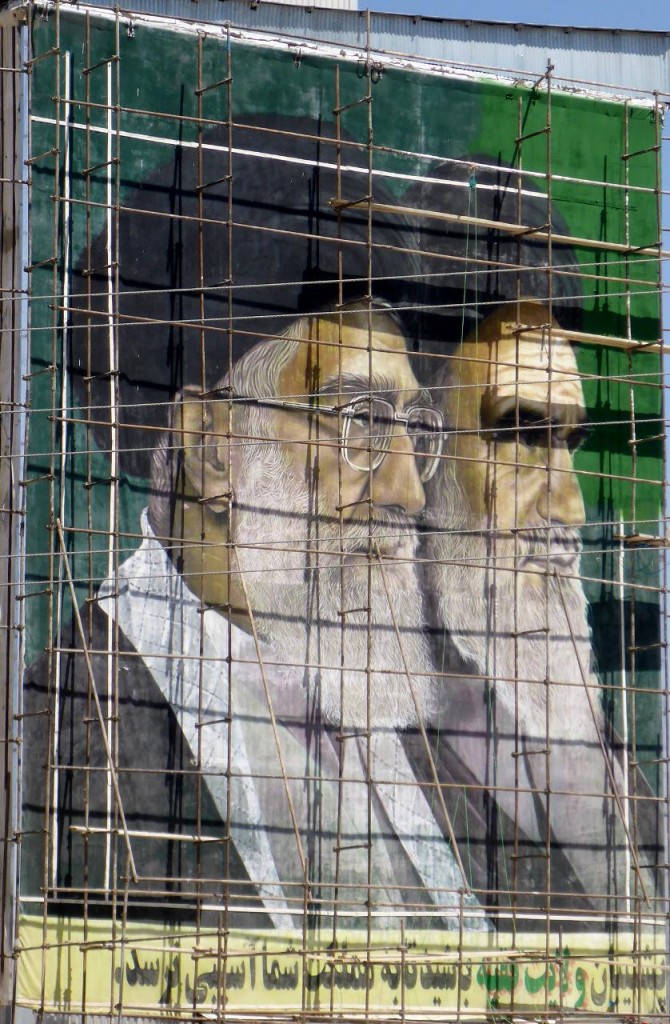 Iran's supreme leader on the left and the religious leader on the right. 