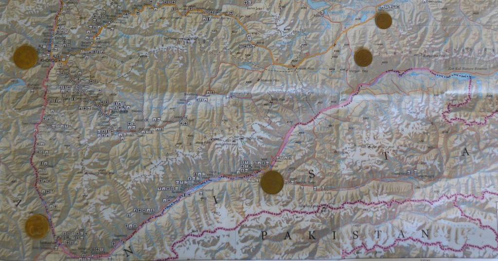Enlarge the picture and follow the coins down and to the right. This is the Wakhan Valley route. 