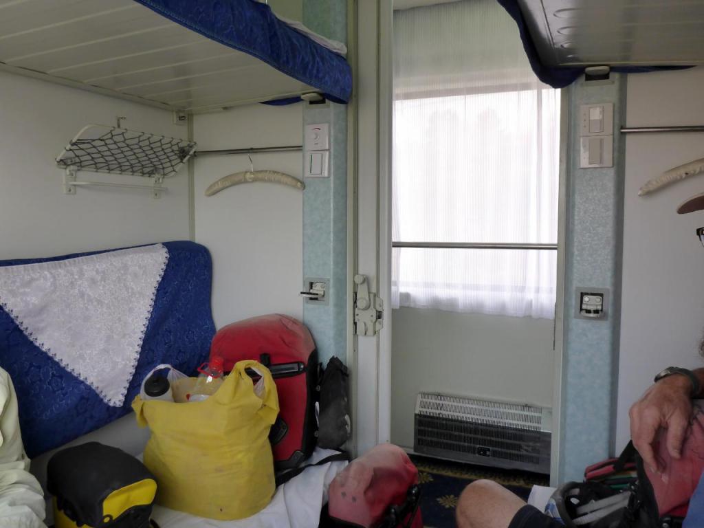 On our ride from Urumqi to Lanzhou we were in a soft sleeper quad. There were two people in the upper berths for part of the trip. There are also 6 berth "hard sleepers" with 3 vertical berths and no doors. 
