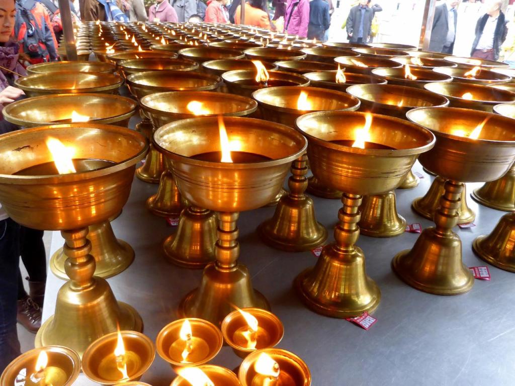 Outside one of the temples are these candles burning... 