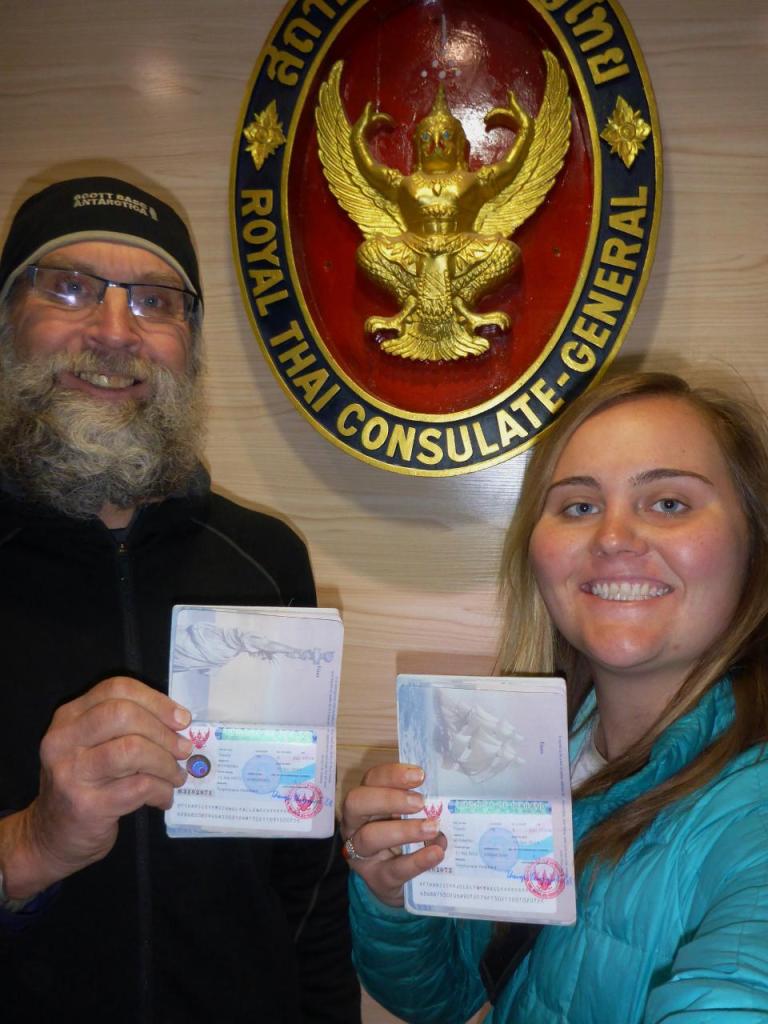 Smiling faces as we can now get back on our bikes. Our passports read like books now. 