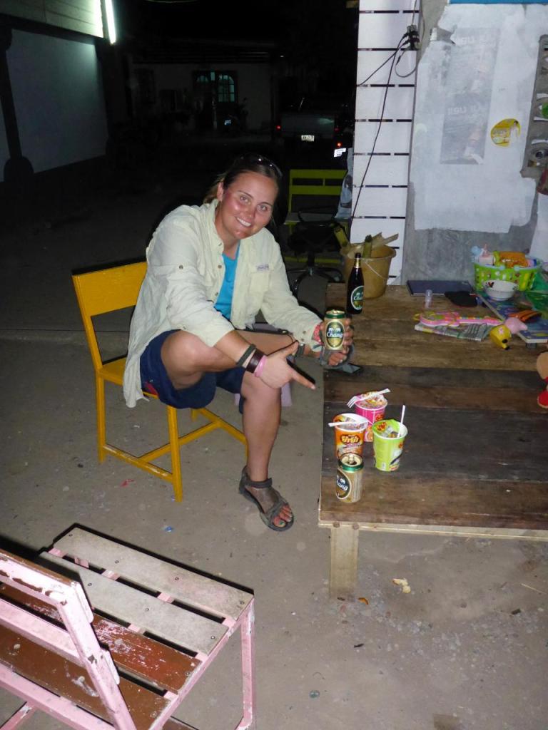 There were no restaurants open near our bungalow. The local market guy heated water for our noodle soup bowls and sat us next to their home. The mosquitoes were awful but the Thai friends we met were fun.