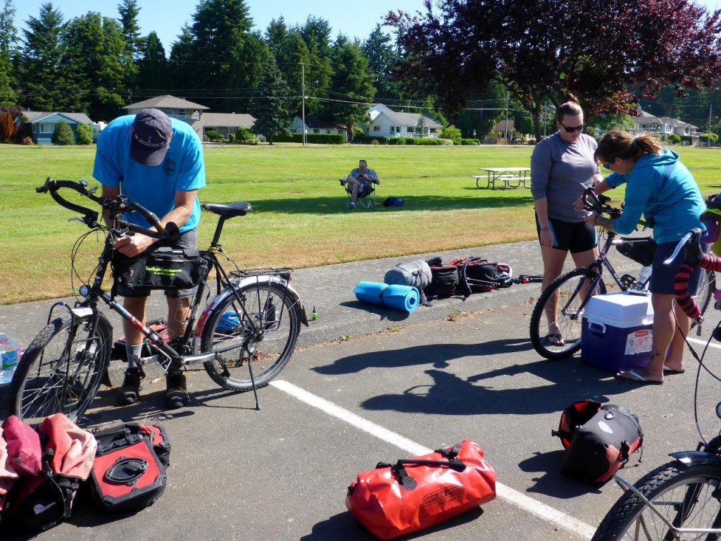Getting our bikes ready at a park near the U.S. Canadian border. 
