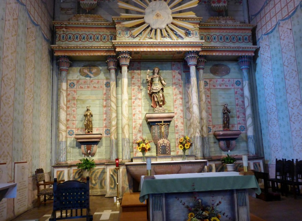 The altar. Priests are buried under the crosses. 
