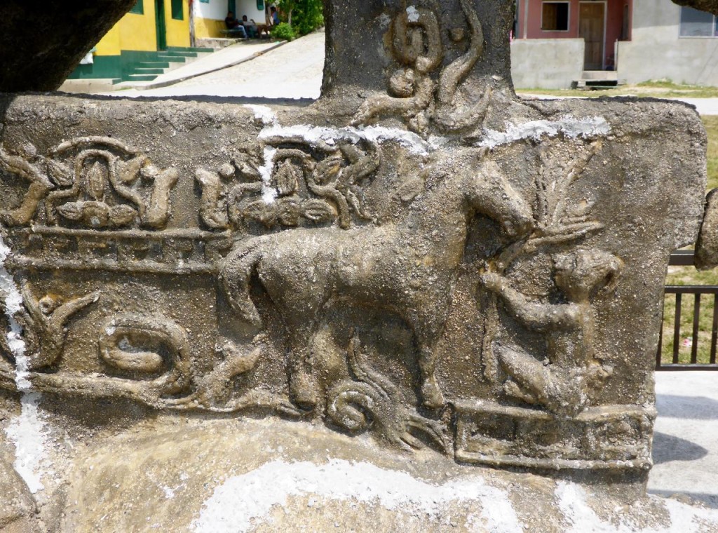 Mayan inscriptions. This also shows a Mayan trying to feed the horse. 