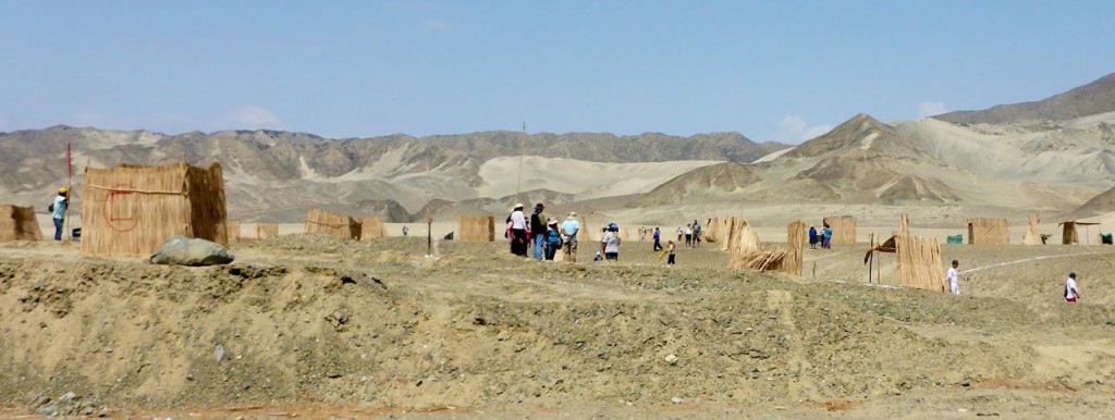 Archaeologists digging through an ancient desert city. 