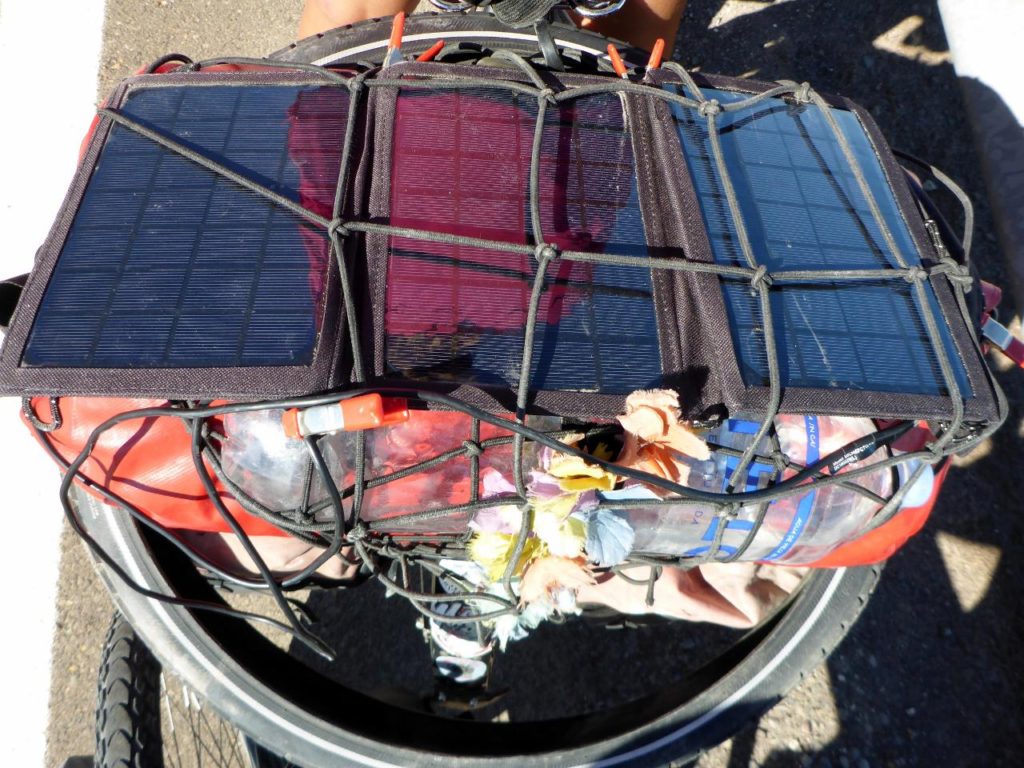 This solar panel charges Jocelyn's phone in less than two hours. 
