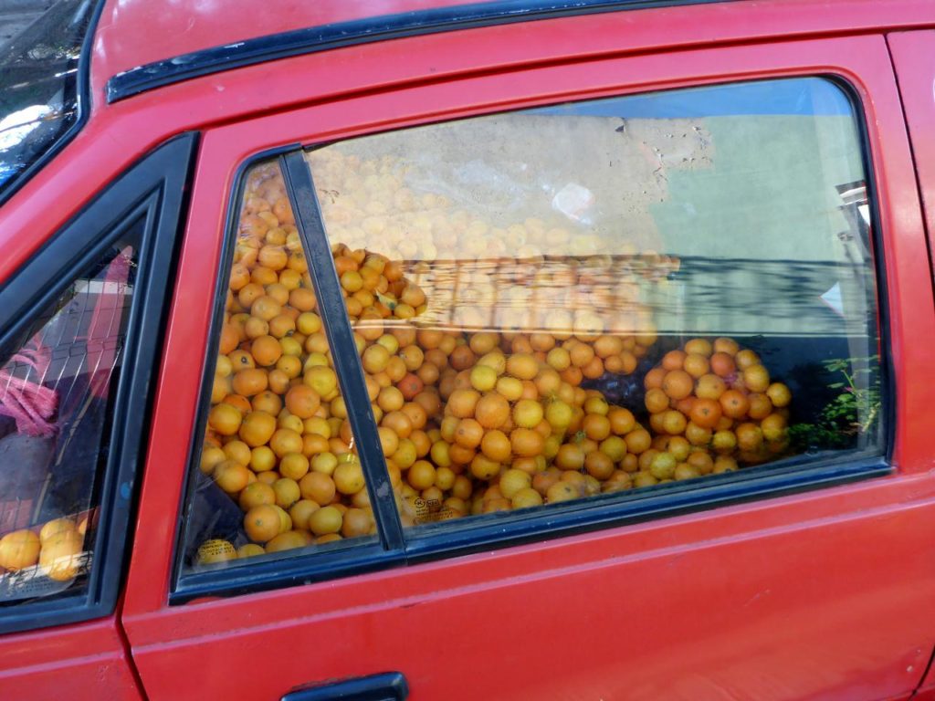 A car full of tangerines. 