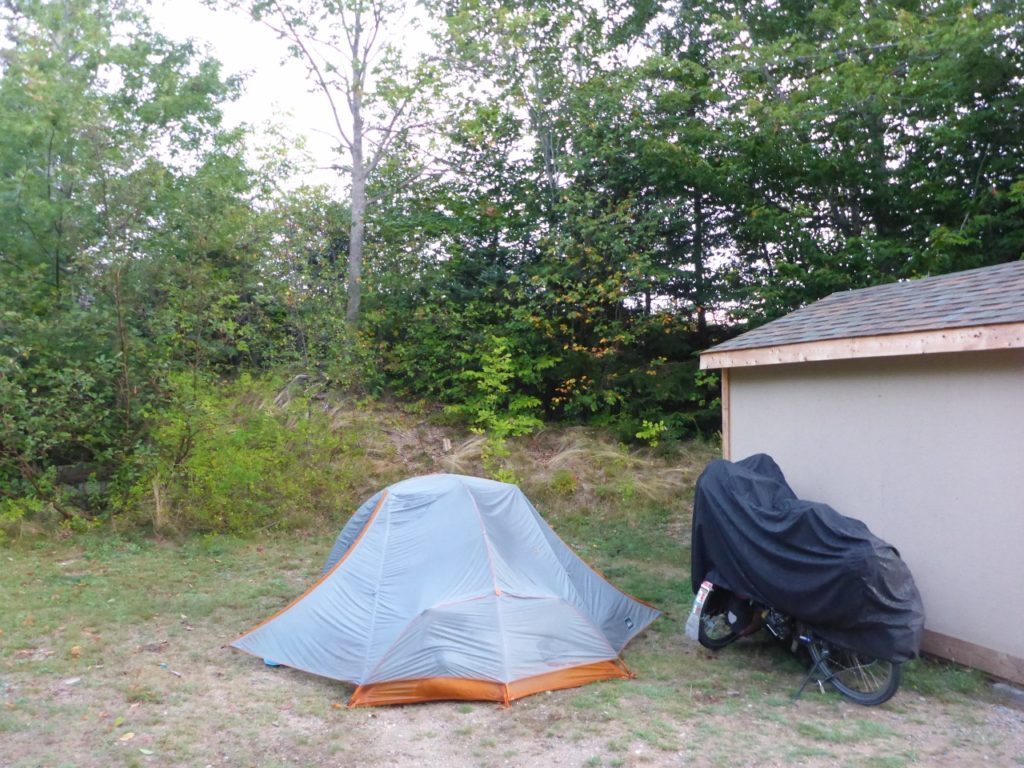 Digby Campground. The second night a cold front came through and we moved our tent into the three walled and roofed structure to the right as we were being flooded.