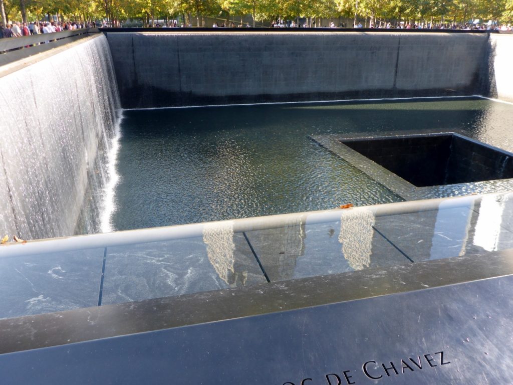 There is a north and a south memorial pool built of the footprints of the two World Trade Centers that were destroyed. Inside each pool is a 60 foot waterfall.
